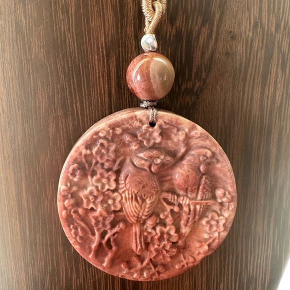Jewelry - Coral Fossil Carved Round Bird Pendant Necklace on Tan Adjustable Rope